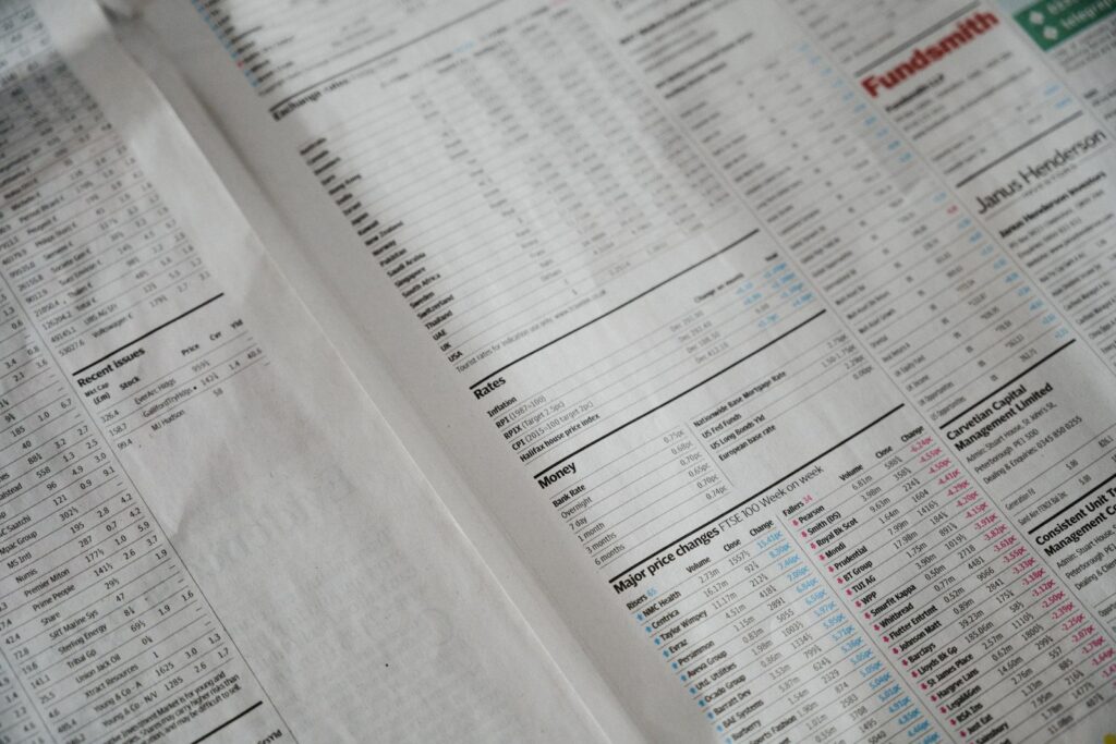 SME owner reviewing invoices and planning cost reduction strategies at a desk