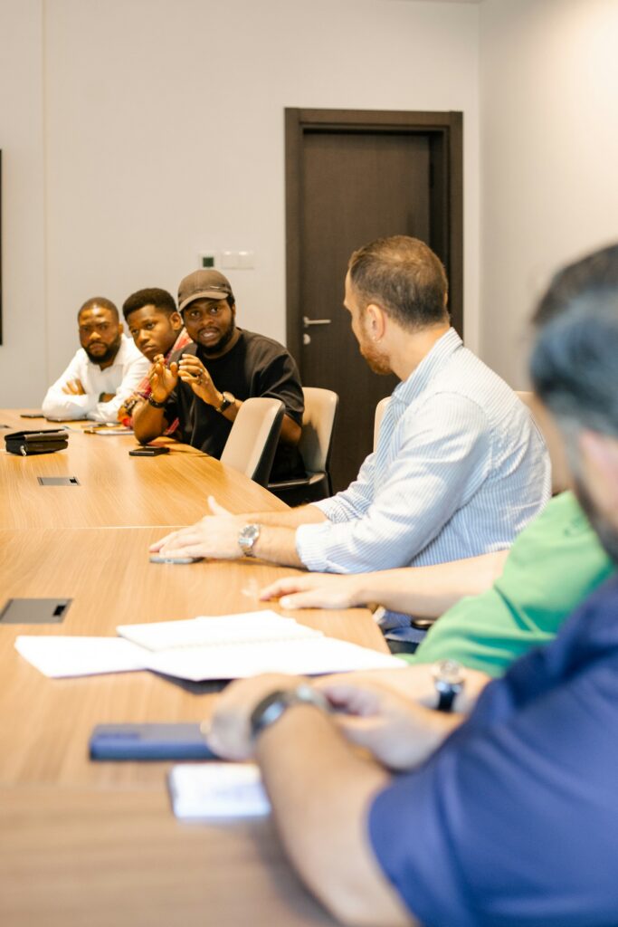 Small business leadership team meeting around a table to review priorities