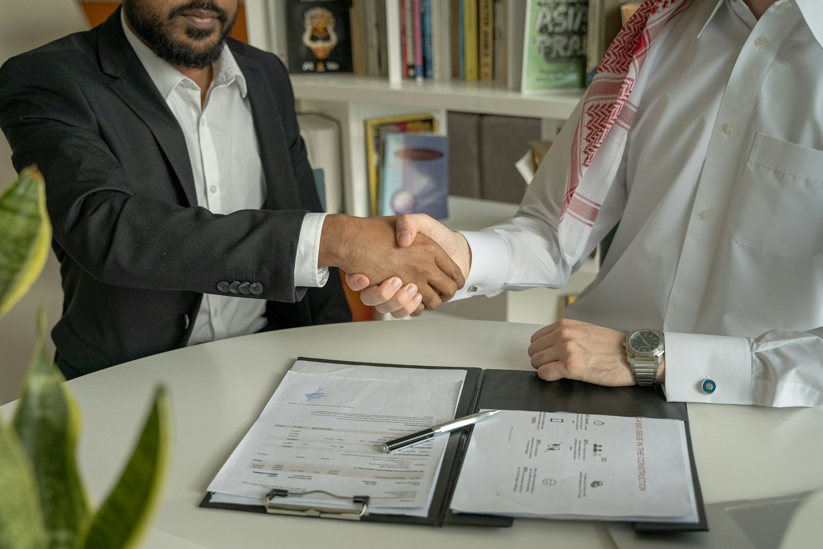 Consultant presenting a proposal to a client, showing how to price consulting services
