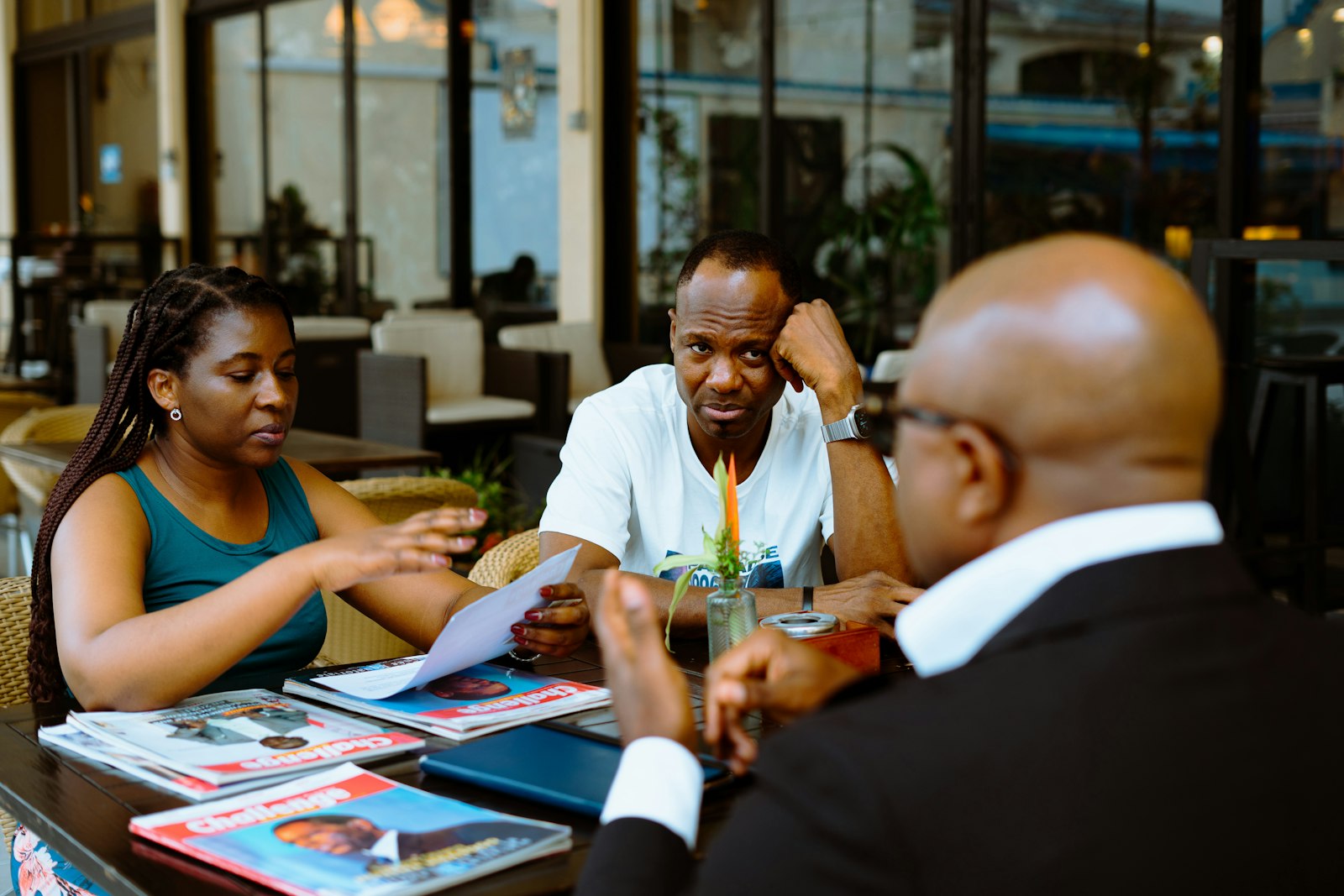 Manager and team member discussing KPIs for employees in a review meeting