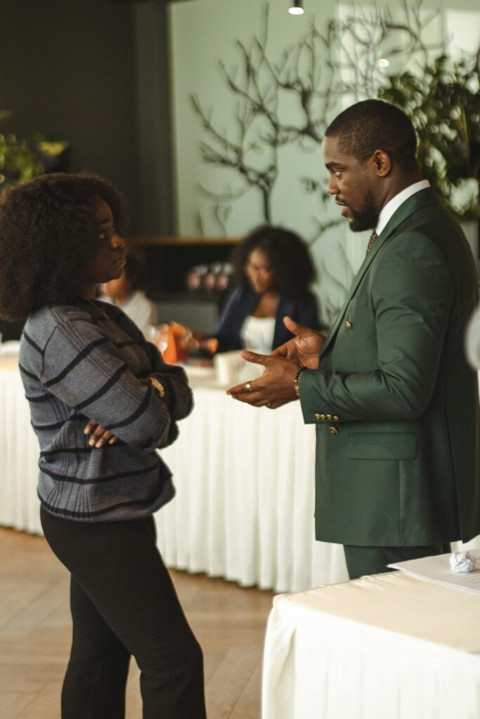 SME owner sharing value proposition examples with a client across a table